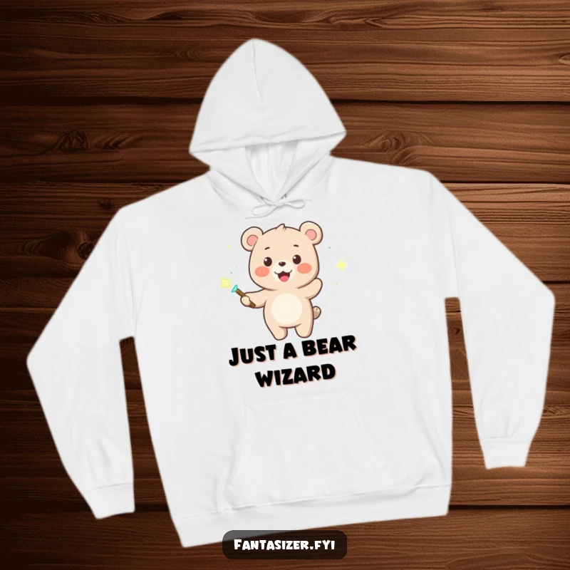 Funny hoodie depicting a smiling bear wizard holding a luminous magic wand, conjuring captivating dancing lights in a magical display.