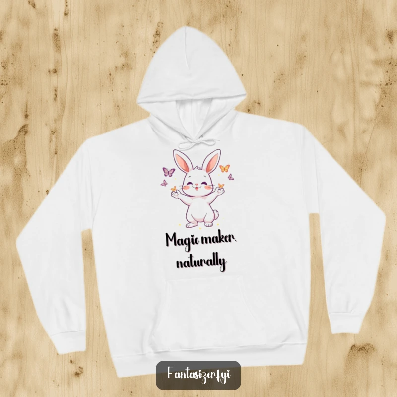 Funny hoodie featuring a playful rabbit conjuring shimmering butterflies from its paws, providing warmth and a touch of enchanting magic.