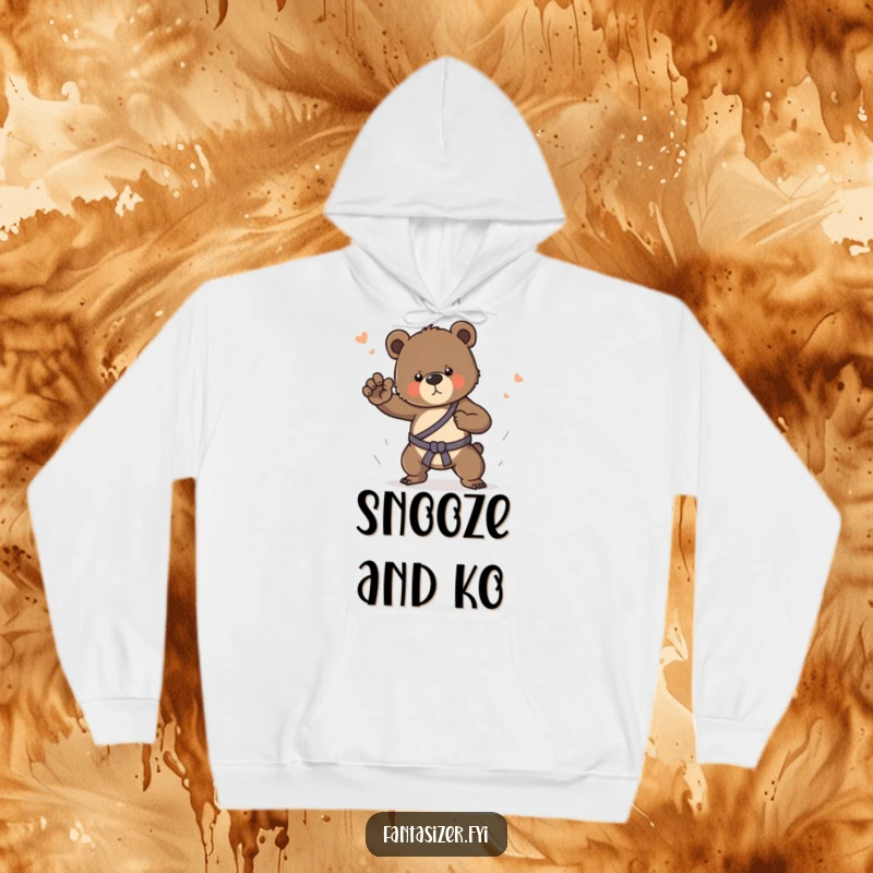 Funny hoodie with a determined bear cub practicing martial arts in a whimsical dream, perfect for cozying up.